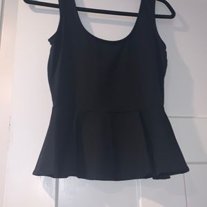 Black peplum Bebe tank top